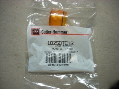 Cutler-hammer plastic amber lens p/n 10250TC43