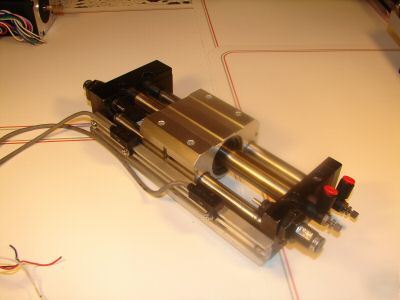 Air operated slide with limit switches