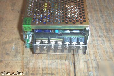 New cosel power supply R100U-5 100-120 in, 5V, 20 a out