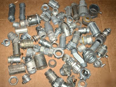 Surplus lot of 50+ assorted electric conduit fittings