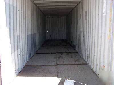 Used 20' or 40' shipping containers - damaged