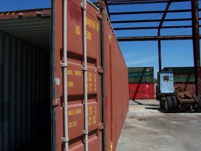 Used 20' or 40' shipping containers - damaged