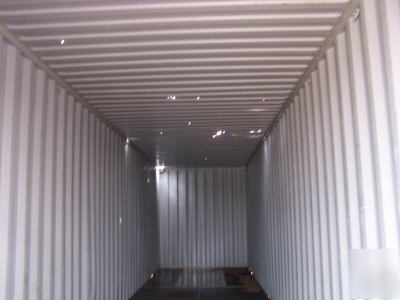 Used 20' or 40' shipping containers - damaged